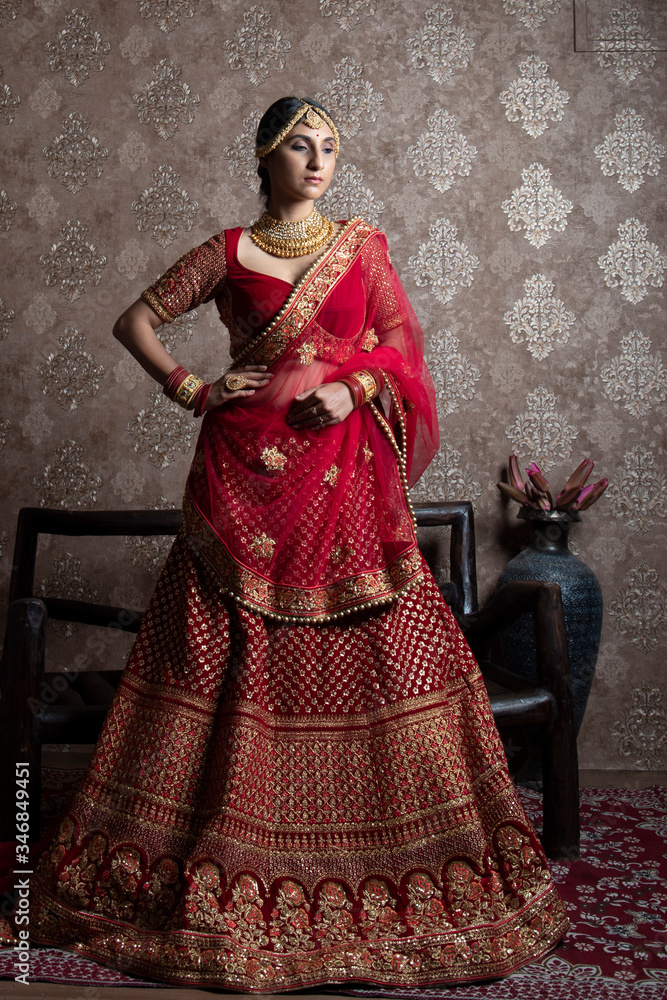 beautiful indian bride wearing traditional indian bridal dress Stock