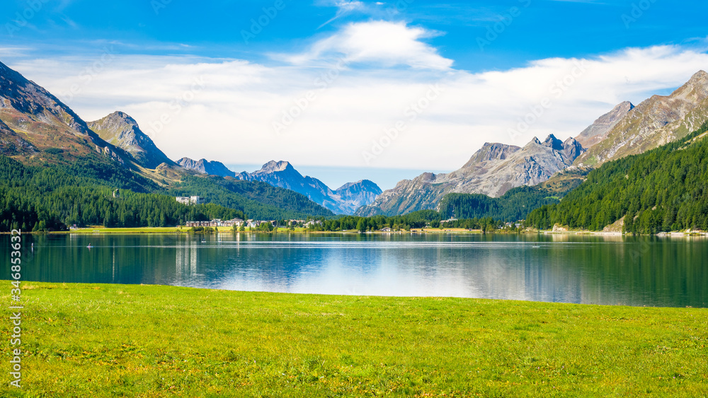 Looking at the Inn river that runs through the Upper Engadine Valley (Graubünden, Switzerland) towars Lake Sils. It lies near Sils, between Lake Silvaplana and the Maloja Pass 