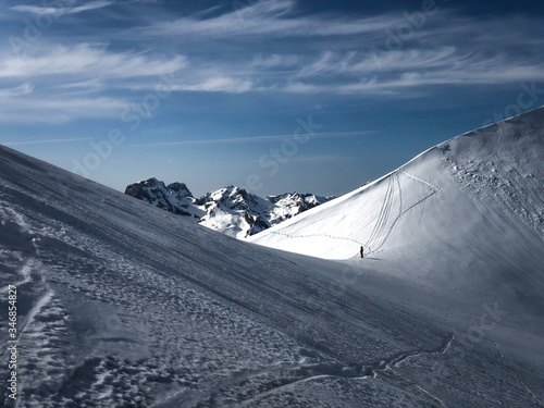 Man hiking in the snow mountains