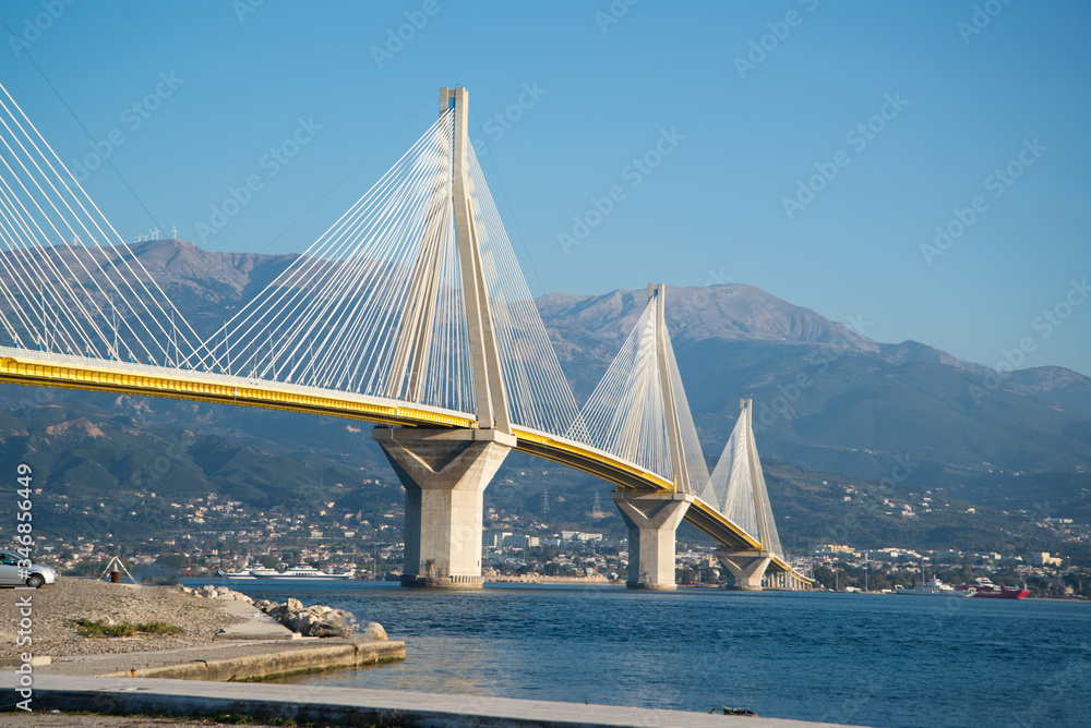 Bridge near Patras city in Greece. Breathtaking sunset scenery with epic red sky.
