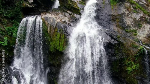 Wallpaper Mural Video of slow motion and backward movement by drone at Krung Ching Waterfall in raining season. There is placed in Abundant forest at Nakhon Si Thammarat province.  Torontodigital.ca