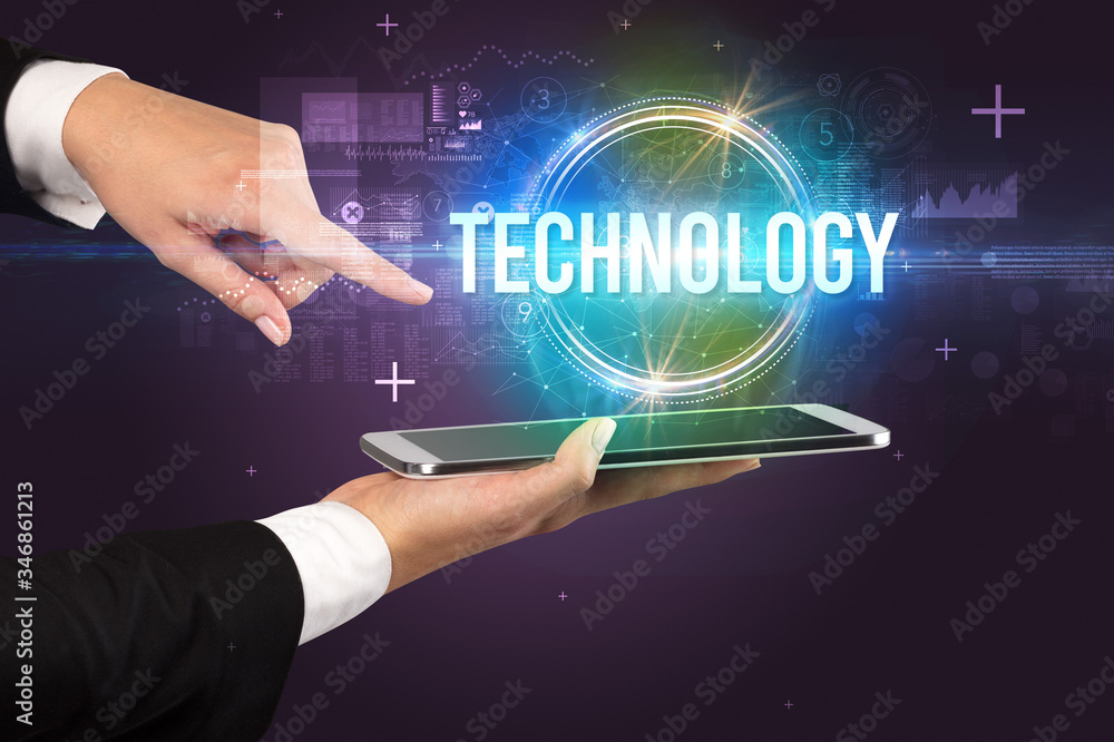 Close-up of a touchscreen with TECHNOLOGY inscription, new technology concept Close-up of a touchscreen with TECHNOLOGY inscription, new technology concept