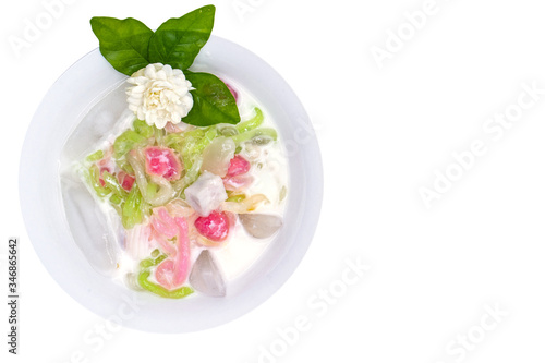 Top view Iced mixed dessert topping with jasmine flower isolated on white background. Clipping path. Summer dessert.