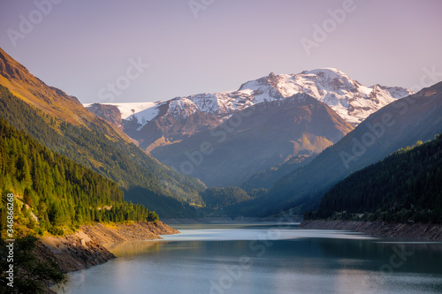 Evening at the gorgeous Gepatsch Reservoir in the Kauner Valley (Tyrol, Austria). This valley features one of the most beautiful mountain roads, the Kauner Valley Glacier Road.