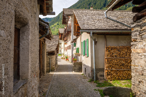 When walking in the Val Bregaglia  Graub  nden  Switzerland  one passes through the gorgeous village of Soglio in the district of Maloja in the Swiss canton of Graub  nden close to the Italian border. 