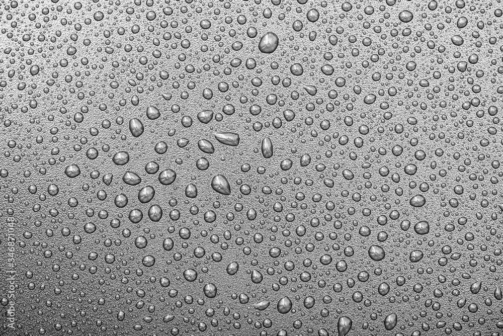 Close-up water drops on surface of grey backdrop or background, water texture, top view, high resolution Close-up water drops on surface of grey backdrop or background, water texture, top view, high resolution