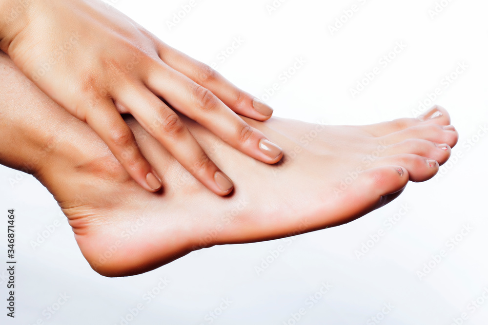 manicure pedicure with flower lily closeup isolated on white perfect shape hands spa salon manicure pedicure with flower lily closeup isolated on white perfect shape hands spa salon