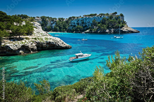 Bootsfahrt im türkis blauem Mittelmeer in der Cala Galdana, Menorca photo