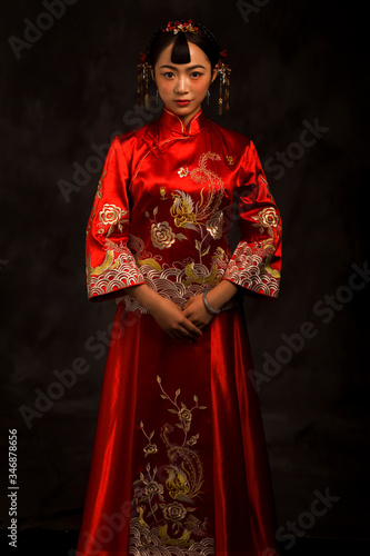 Ancient Asian brides in red on a black background