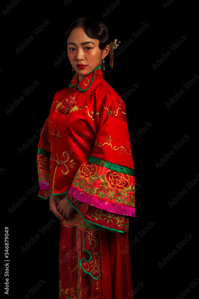 Ancient Asian brides in red on a black background Ancient Asian brides in red on a black background