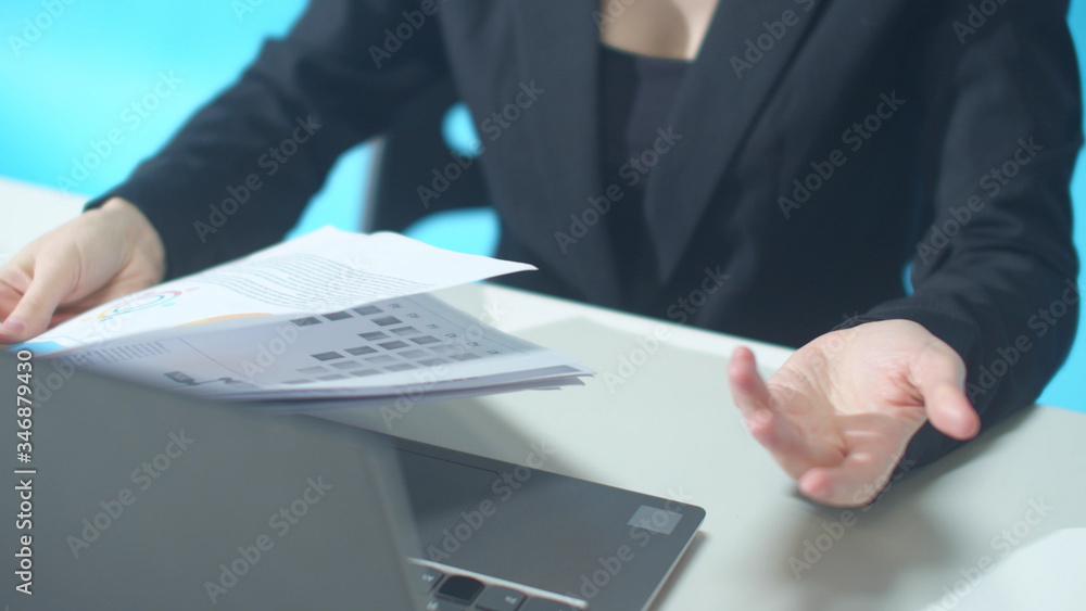 Documents were thrown onto the desk of a worker Documents were thrown onto the desk of a worker