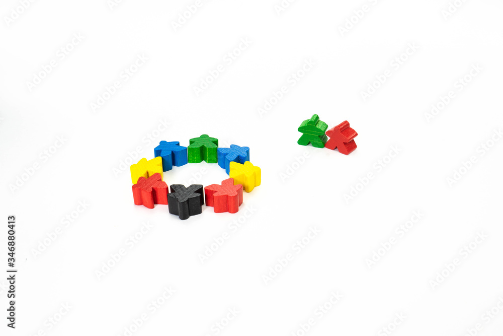 People for board games are on a white background. They are of different colors. Wooden toy people symbolize friendship, tolerance and unity. People for board games are on a white background. They are of different colors. Wooden toy people symbolize friendship, tolerance and unity.