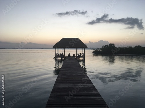 Beautiful ocean view with clean water, evening or night Amazing background of island, Caribbean, Lagoon Bacalar. Calm secluded place. people meet the damn or sunset, paradise