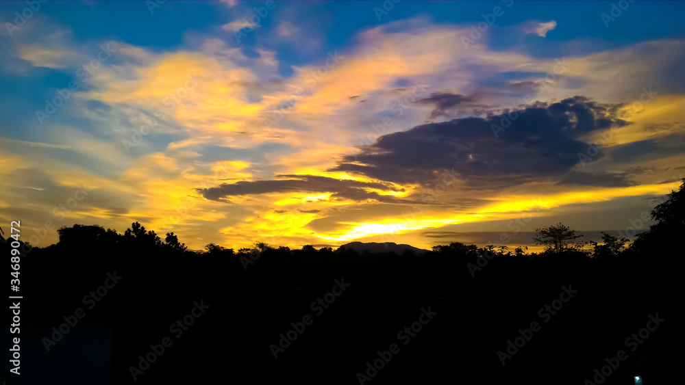 Skyscape view of sun set with cloud Skyscape view of sun set with cloud