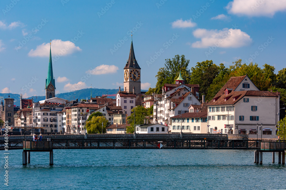 Famous Fraumunster and Church of St Peter and river Limmat Old Town of Zurich, the largest city in Switzerland
