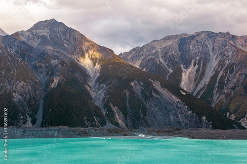 High mountains above the glacial lake. Southern Alps. South Island, New Zealand