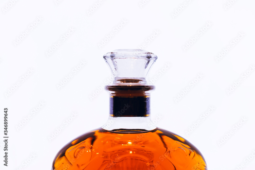 Bottle of expensive whiskey on the white background. Copy space included. Bottle of expensive whiskey on the white background. Copy space included.
