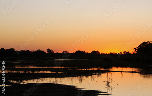 Sunset on the river © hanjosan