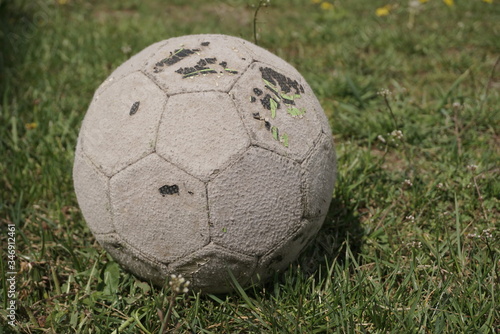 old ball on the grass