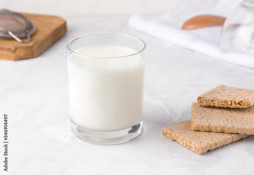 Milk kefir on a white background. Fermented products Milk kefir on a white background. Fermented products