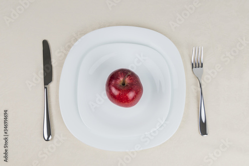 A healthy meal with a red apple