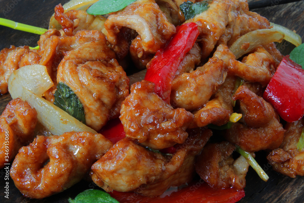 Azeatian cooking, pork in sweet and sour sauce. Chinese cuisine.
Azeatian cooking, pork in sweet and sour sauce. Chinese cuisine.