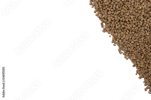 Granules of animal feed close up. Background texture isolated © Дмитрий Ульяненко