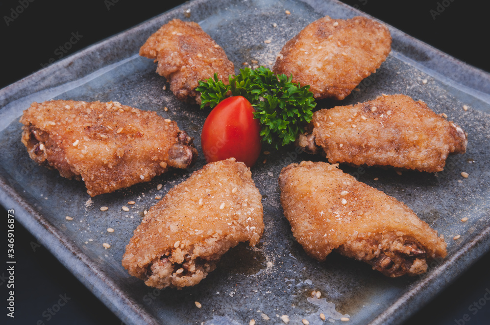 Fried crispy chicken wing in Japanese style. Fried crispy chicken wing in Japanese style.