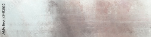 wide art grunge abstract painting background texture with pastel gray, light gray and rosy brown colors and space for text or image. can be used as horizontal background texture