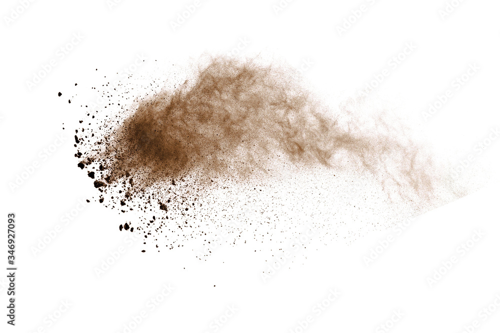 Explosion of brown powder on black background. Explosion of brown powder on black background.
