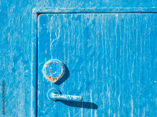 Texture Cracked Paint at Klima Fishing Village - Milos Island, Greece photo