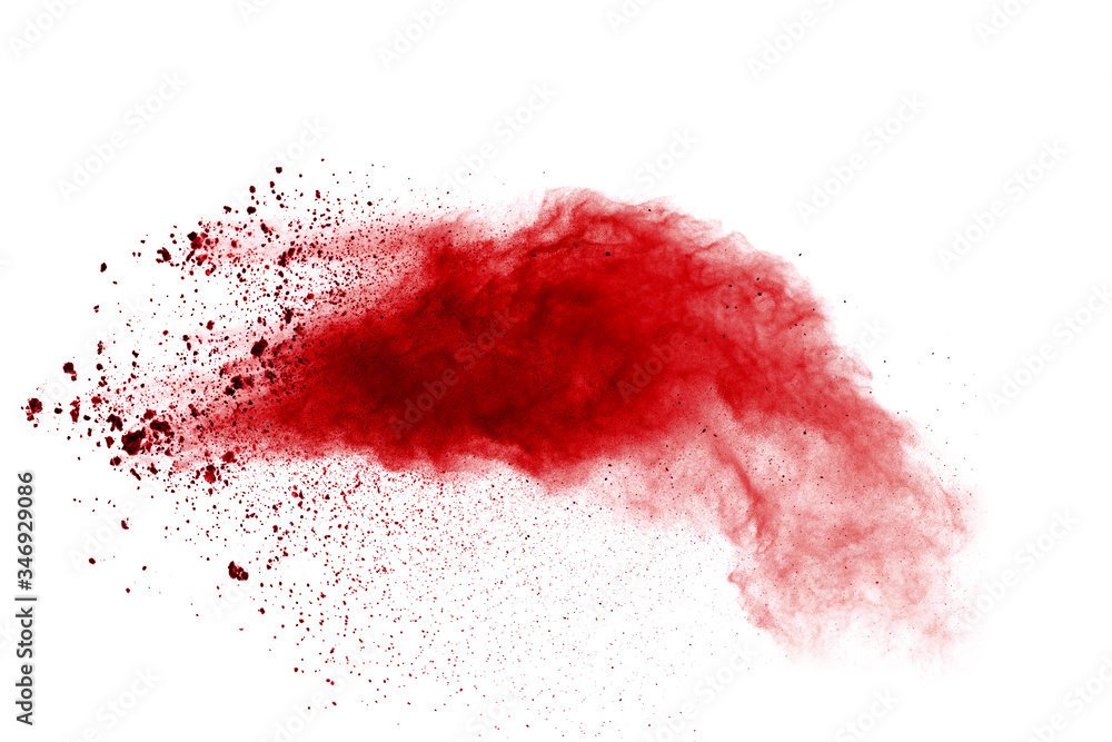Red powder explosion on white background. Colored cloud. Colorful dust explode. Paint Holi.