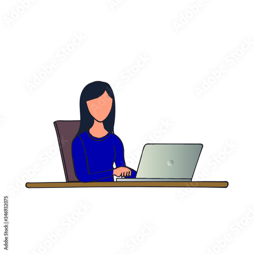 Business women working on laptop. Girl next to the desk in the office