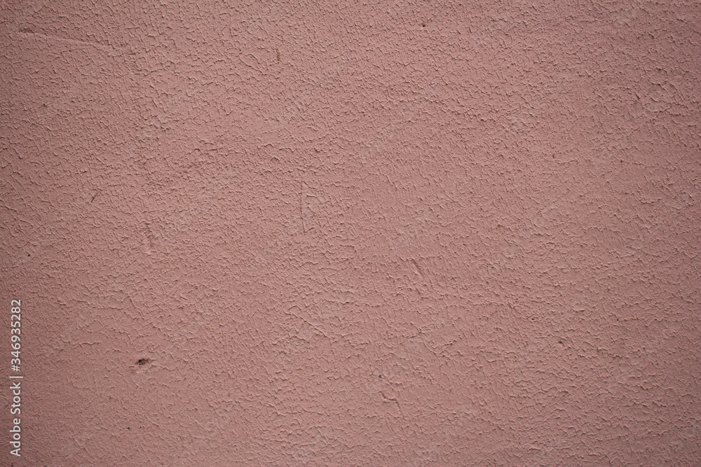 Crack of plastered pink wall background texture. Crack of plastered pink wall background texture.