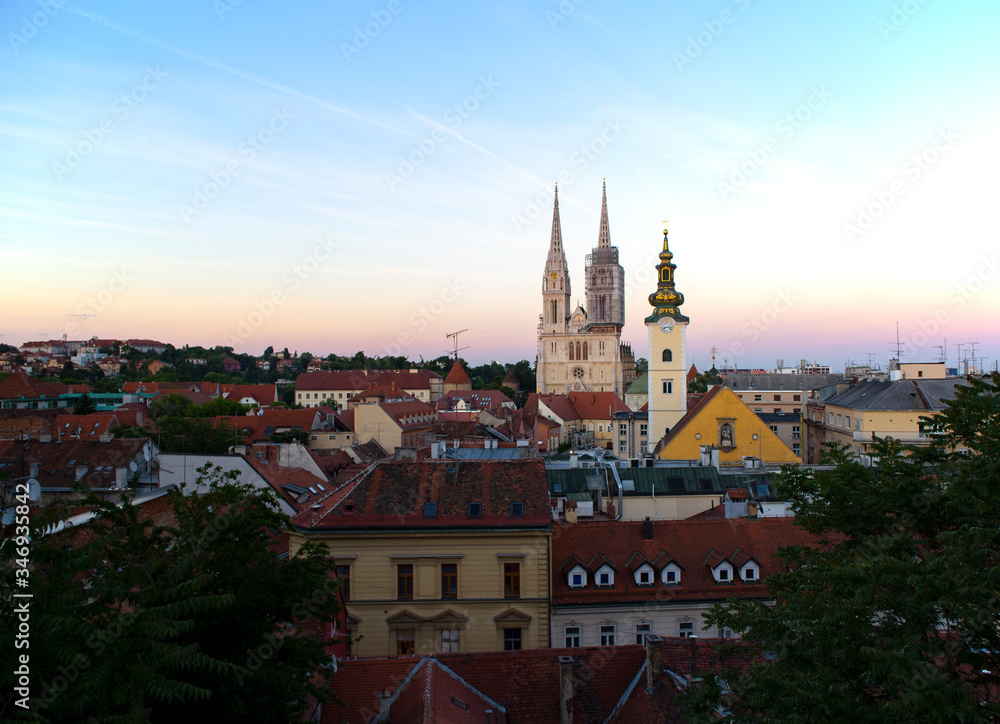 Obraz premium Beautiful gothic cathedral in Zagreb with two towers behind the catholich church, before strong earthquake in Zagreb that damaged and broke off south tower