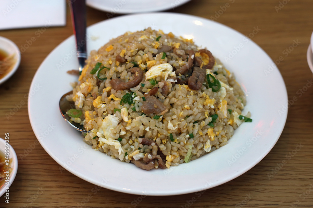 Fried brown rice with beef and vegetables in Din Tai Fung restaurant of Mall of the Emirates in Dubai UAE, December 2019. Healthy, delicious and fresh asian food offering good value for money. Fried brown rice with beef and vegetables in Din Tai Fung restaurant of Mall of the Emirates in Dubai UAE, December 2019. Healthy, delicious and fresh asian food offering good value for money.