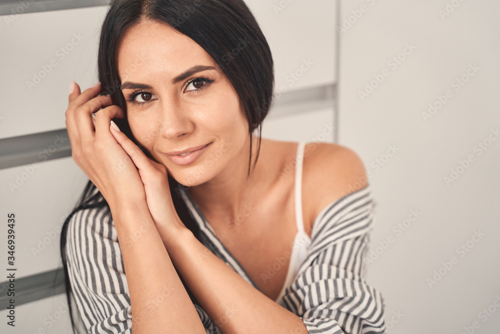 Portrait of charming female that demonstrating her smile Portrait of charming female that demonstrating her smile
