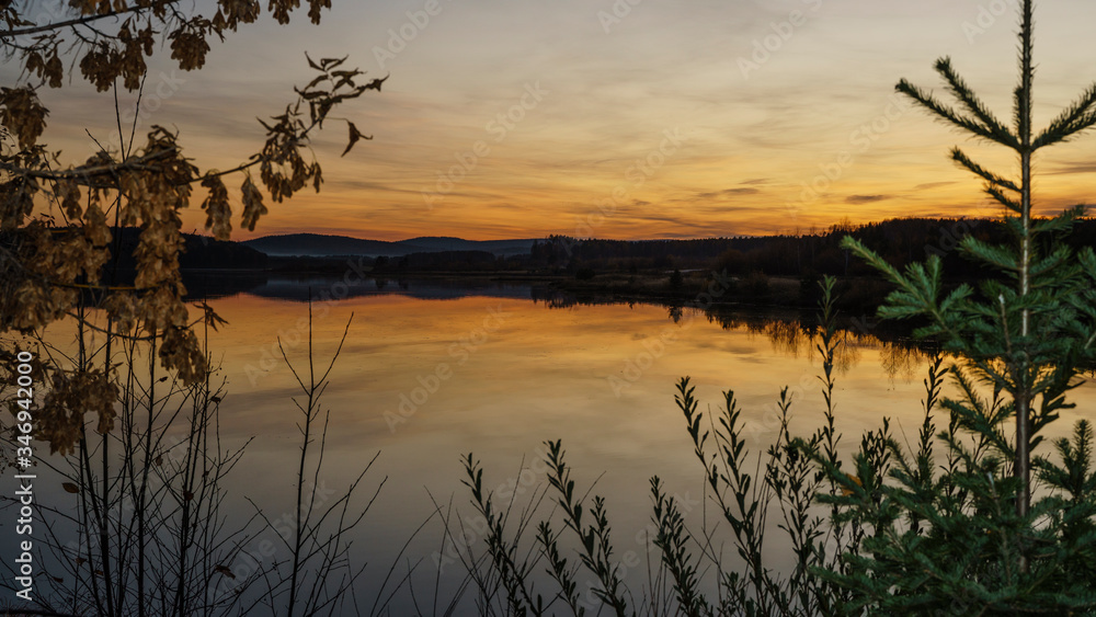 Autumn evening on the lake after sunset Autumn evening on the lake after sunset
