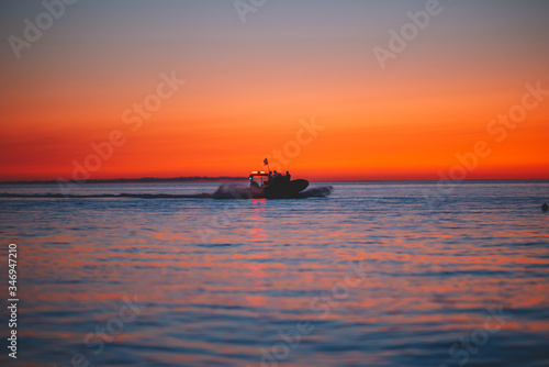 Patrol ship silhouette at the sunset © David Khelashvili