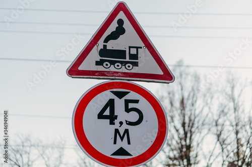 Fotografie Road sign. Iron level crossing without a barrier.