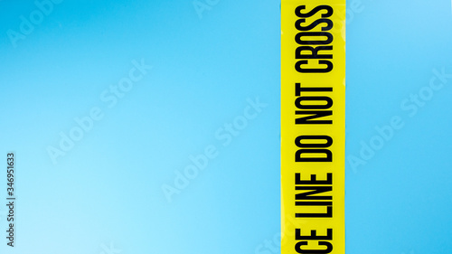yellow do not cross line on blue background 