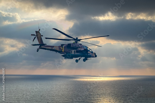 IDF, Israeli Air Force, Apache helicopter fly above the ocean 