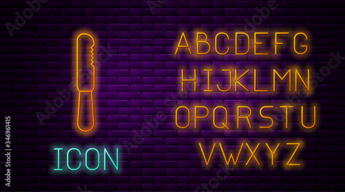Glowing neon line Disposable plastic knife icon isolated on brick wall background. Neon light alphabet. Vector Illustration