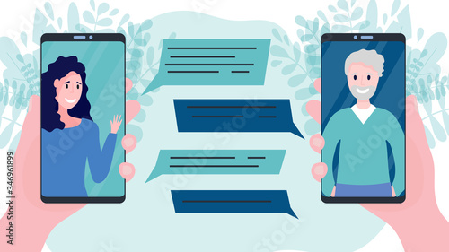 Two hands holding smart phones or cellular phones with video call between happy woman and her father or grandfather with speech bubbles. Concept of online communication with friends, relatives