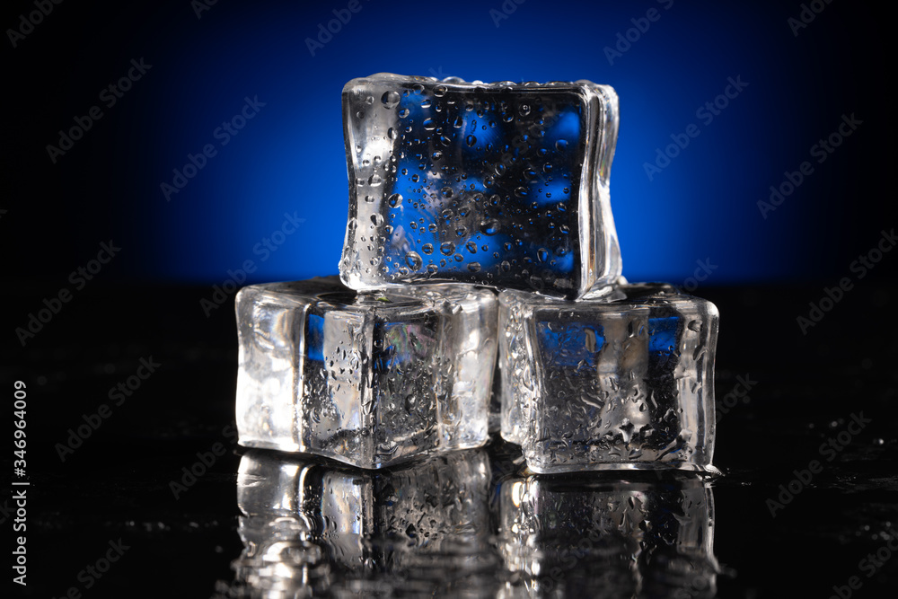 ice cubes on black background ice cubes on black background