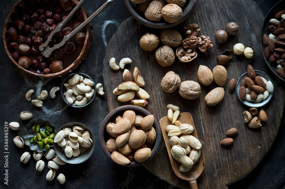 Tray and bowls of various nuts Tray and bowls of various nuts