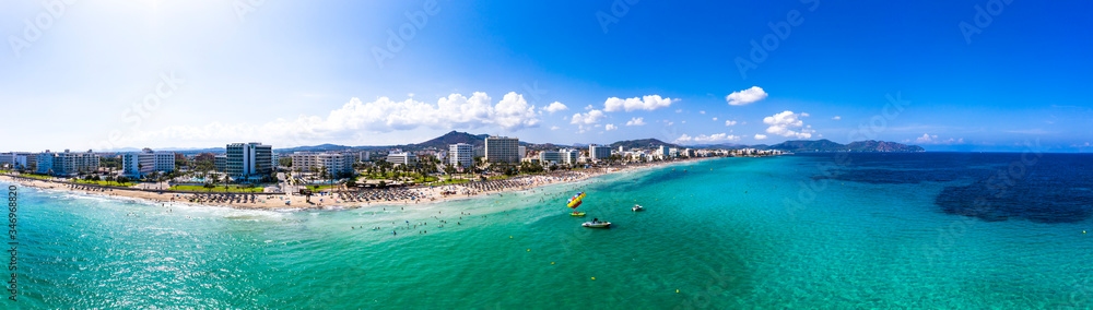 Spain, Balearic Islands,?Cala?Bona, Aerial panorama of coastline of resort town in summer Spain, Balearic Islands,?Cala?Bona, Aerial panorama of coastline of resort town in summer