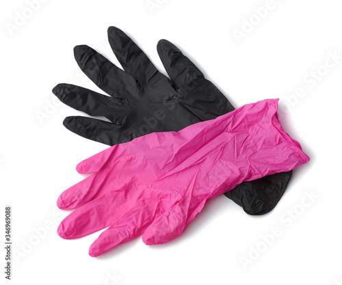 pink and black latex gloves isolated on a white background