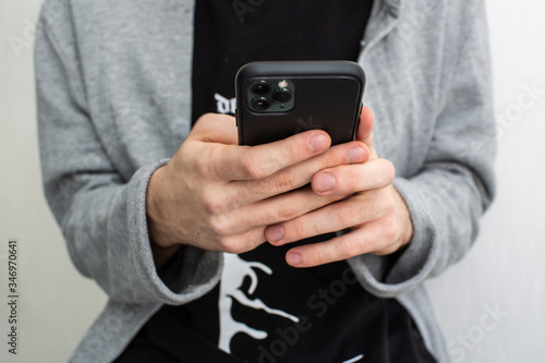 man hands with smartphone, close-up