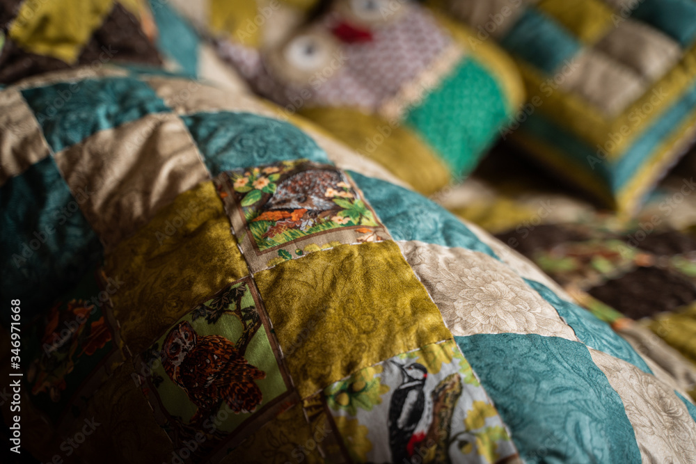 Handcraftred blanket patterns closeup (quilting)
